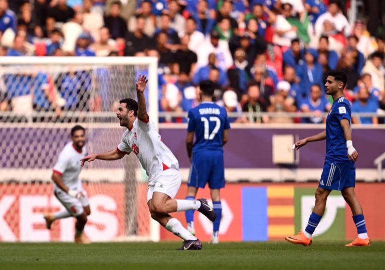 DOHA, QATAR - DECEMBER 06: Mohannad Abutaha of Jordan celebrates scoring his team's first goal during the FIFA Arab Cup 2025 Group C match between Kuwait and Jordan at Ahmad Bin Ali Stadium on December 06, 2025 in Doha, Qatar. (Photo by Tullio Puglia - FIFA/FIFA via Getty Images)